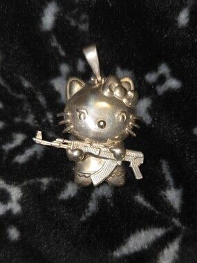 Hello Kitty Pendant with Rifle Charm
